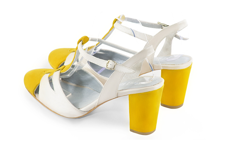 Yellow and off white women's open back T-strap shoes. Round toe. High block heels. Rear view - Florence KOOIJMAN